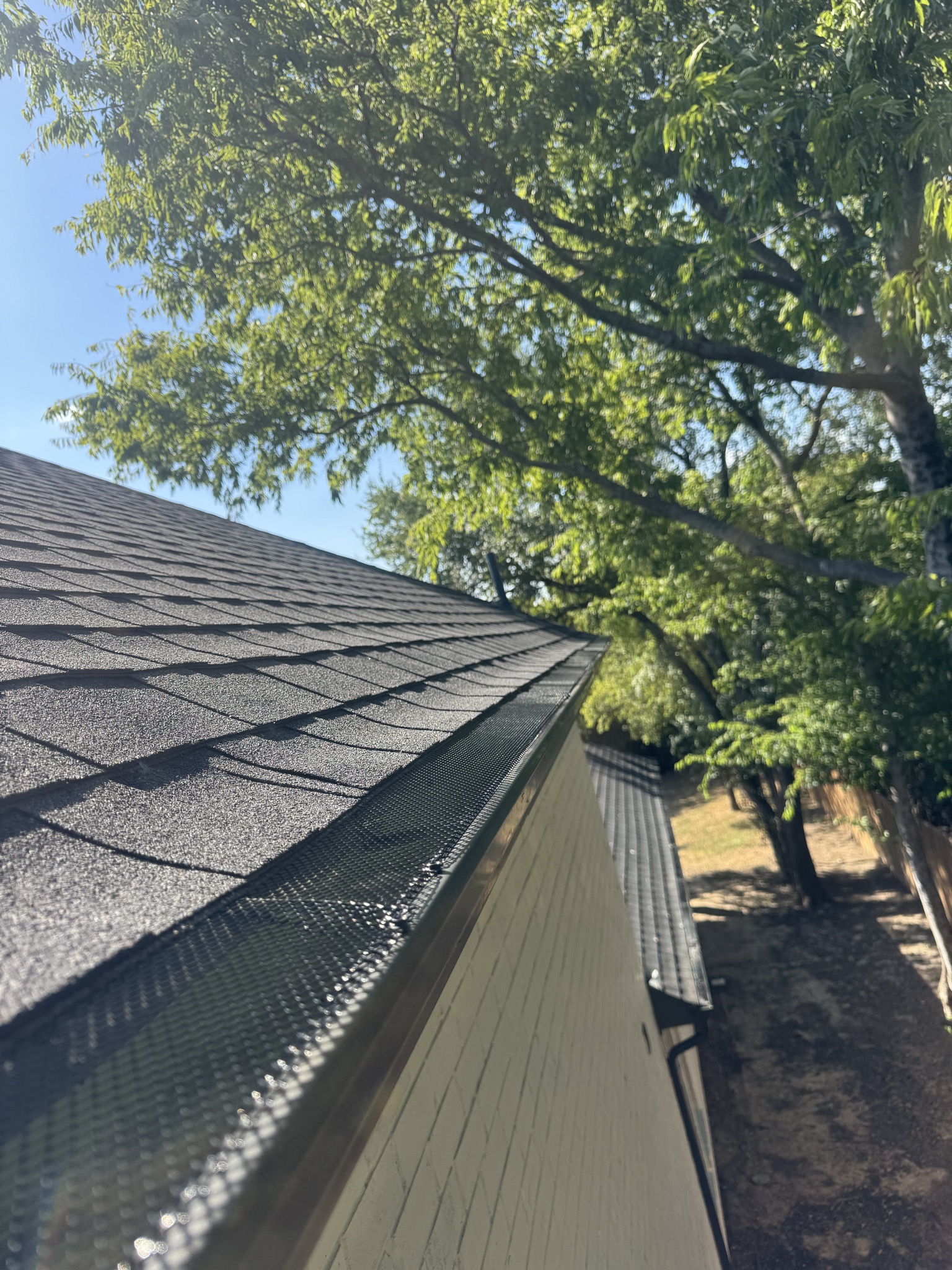 Gutter guard retrofit on an existing system in Arlington, TX