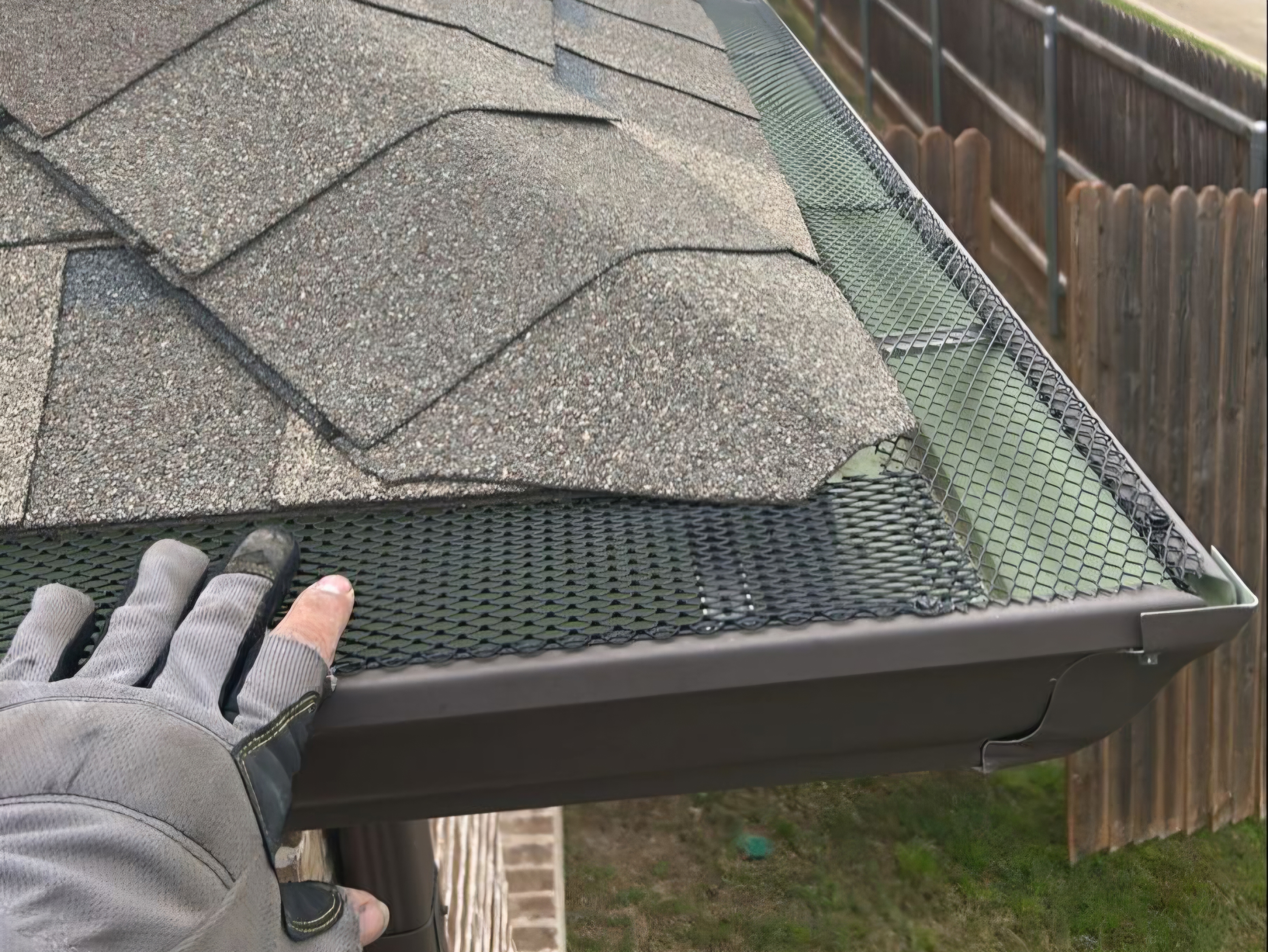 Gutter guard installed to prevent leaf clogging